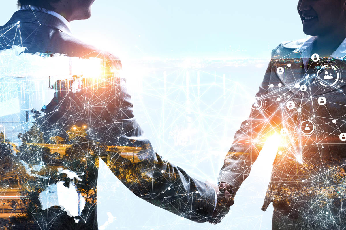 Two men in suits shaking hands with multiple graphics overlaid on top of them