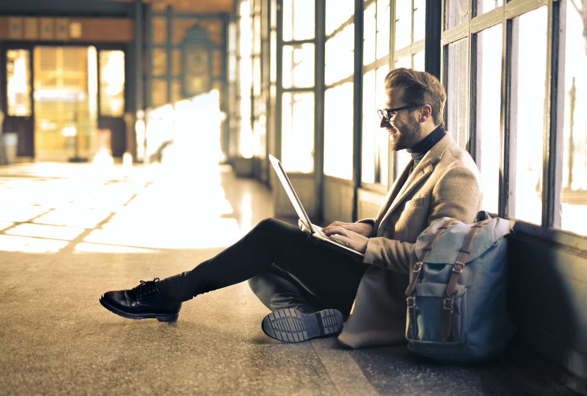 A man working while traveling